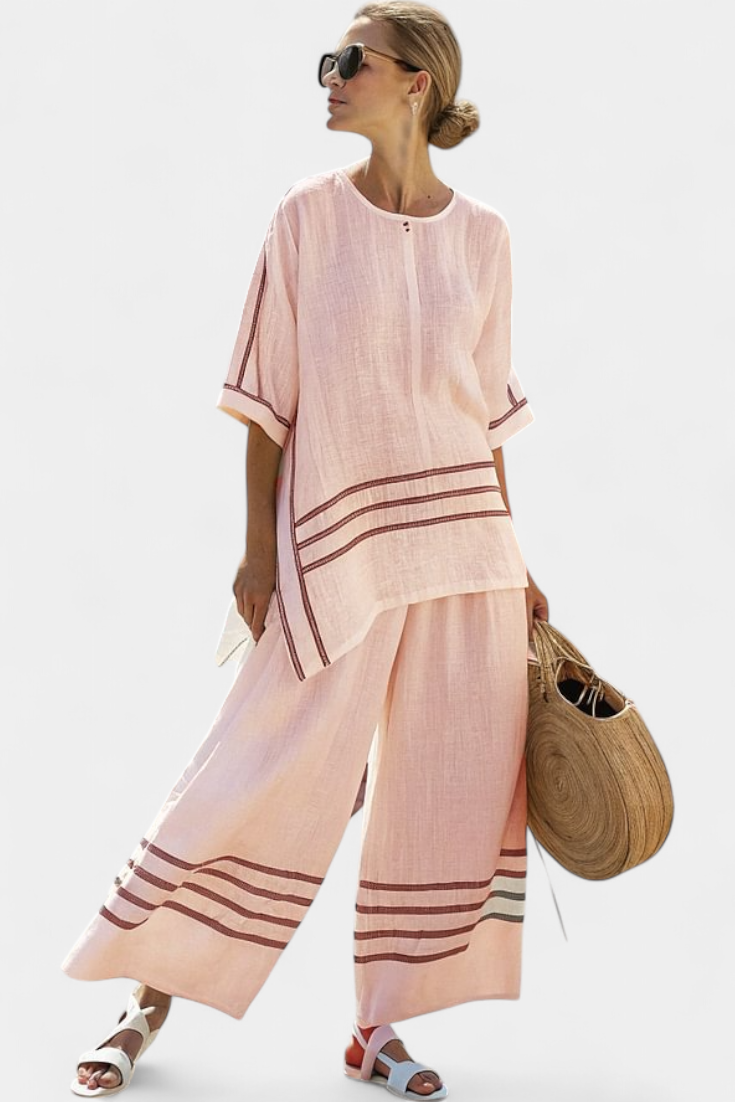 Vittorina – sophisticated asymmetric striped top and bold pants