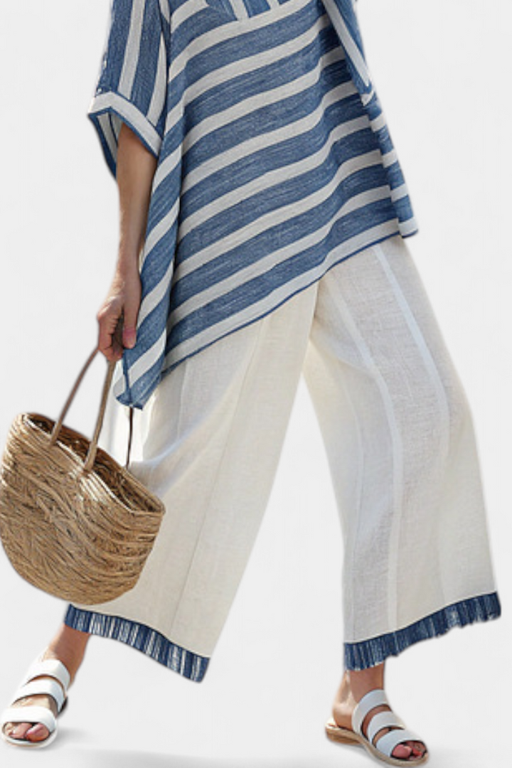 Ornella – sophisticated blue striped top and pants with details at the bottom